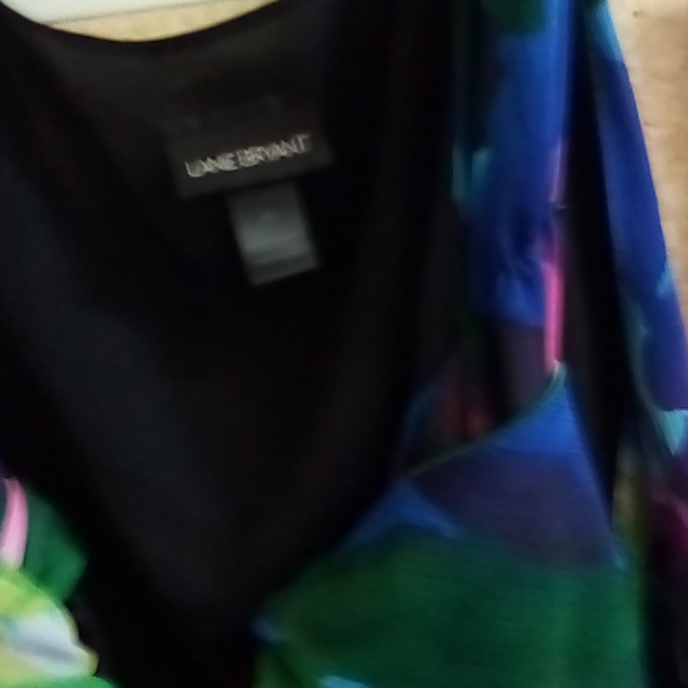 Tank top beautiful top lots of water color blues,greens,purples,pinks,browns.